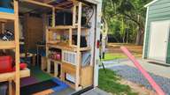 I need to frame up a wall with a door opening for a screen door. It has to be easily removeable for service.