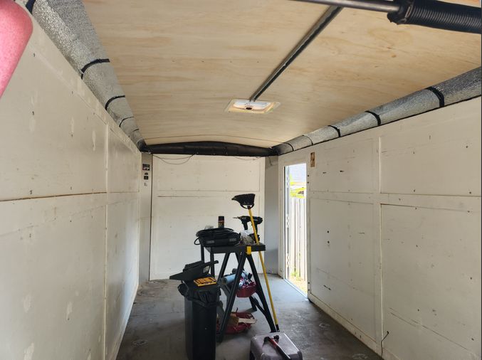 interior of trailer after insulation was installed.