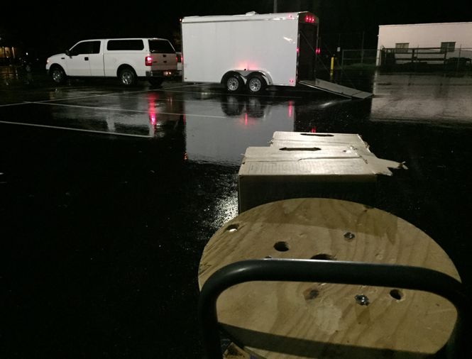 loading out in the rain at night