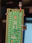 The back of the Pico. You can see the reboot switch soldered between RUN and GND.