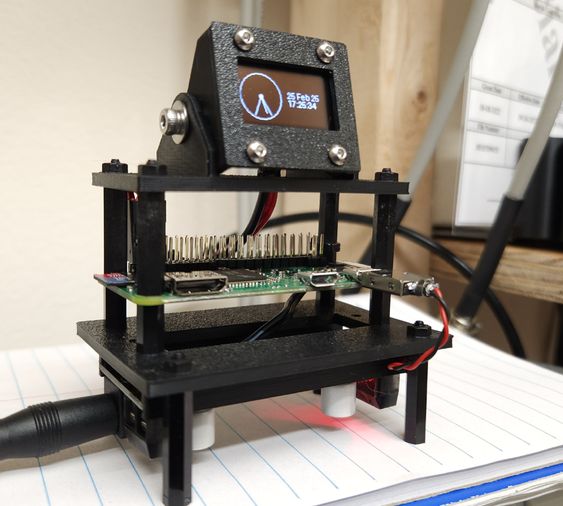 A Pi Zero with 0.96 inch OLED display.